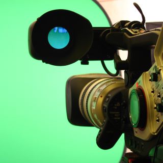 James' camera, lighting, and green screen studio setup.