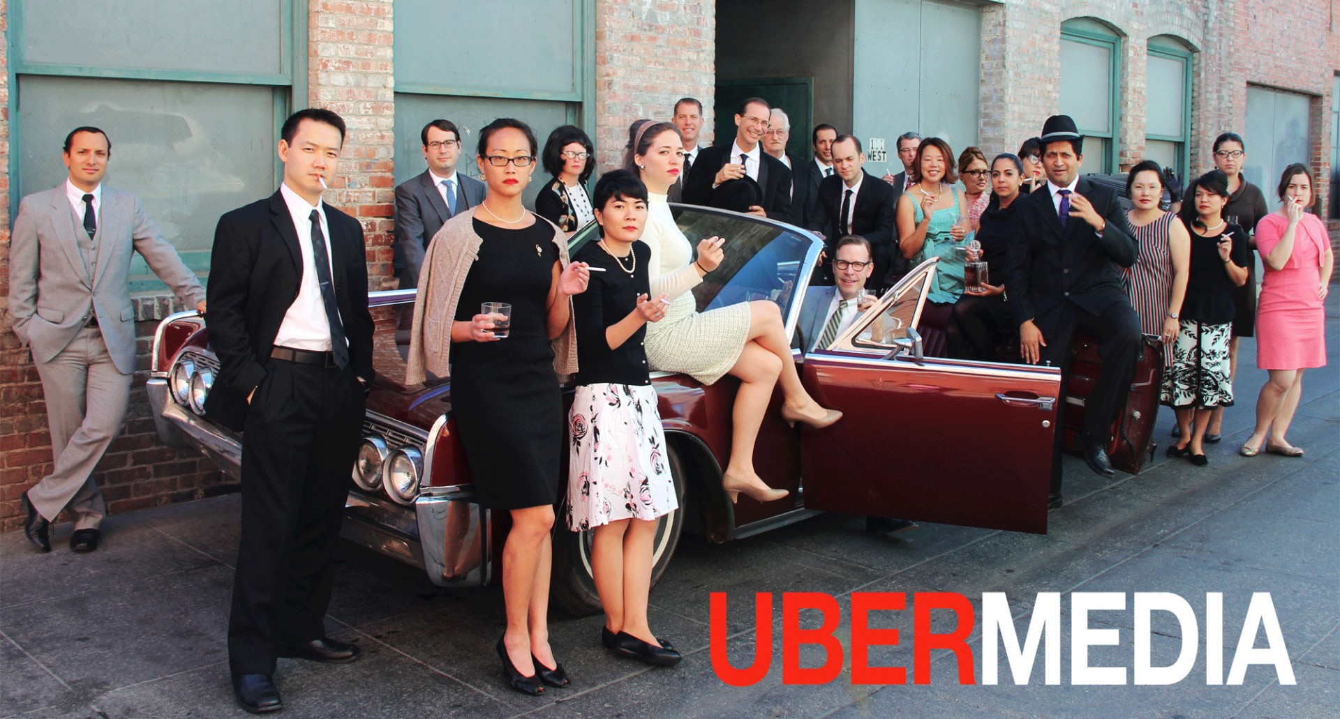 James and the UberMedia ad agency dressed as "Mad Men" cast. 